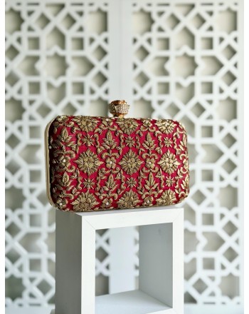 Red embroidered evening clutch