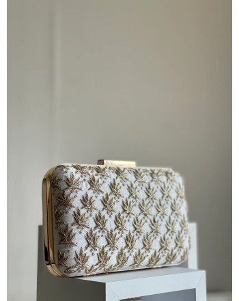 Ivory-colored gold leaf...