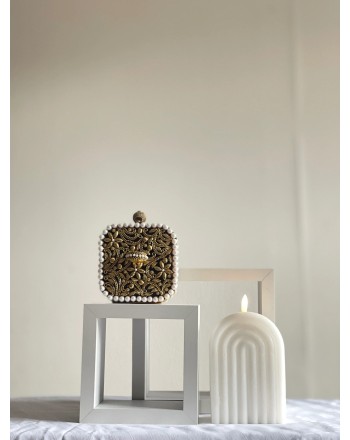 Square clutch bag adorned...