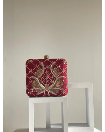 Embroidered red square...