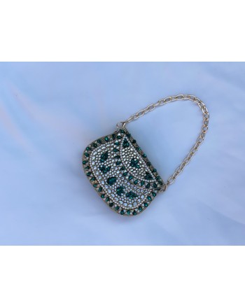 Emerald-encrusted mini clutch